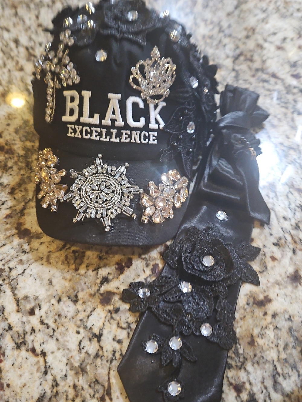 BLACK EXCELLENCE Embellished Black Baseball Cap with Decorative Scarf